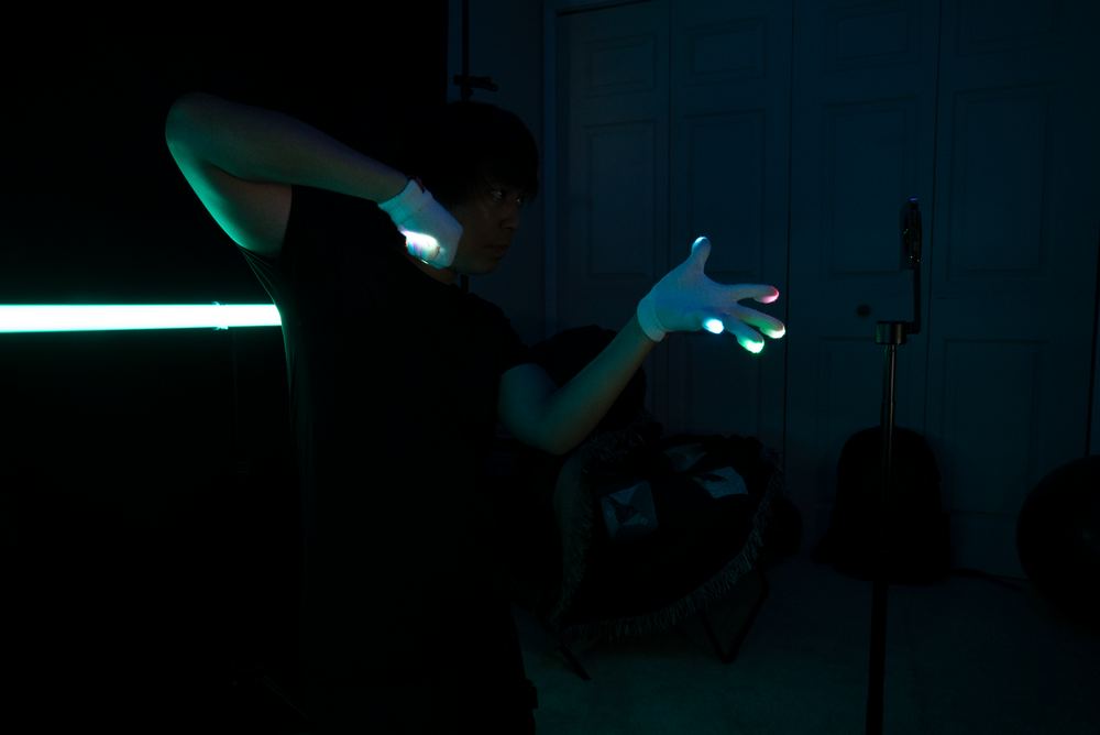 A phone mounted on a tripod filming a glover, showing the distance and angle to set up