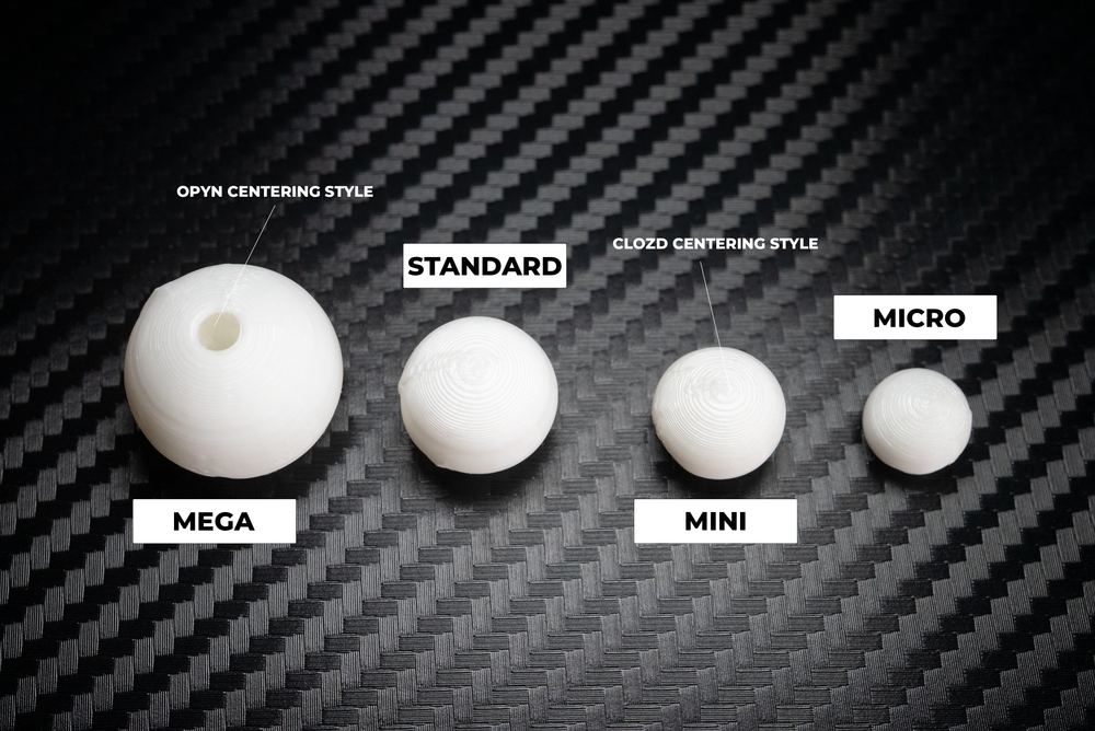 Flat-lay of Classic Diffusers in Mega, Standard, Mini, and Micro sizes, labeled with OPYN and CLOZD centering styles